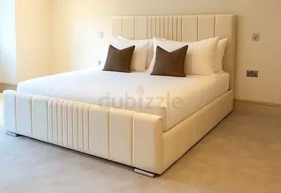 Brand New off white colour 180*200 King size bed.