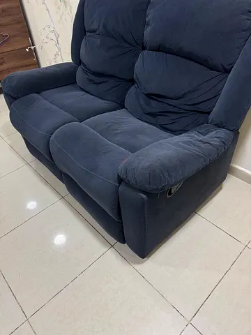 Comfortable 2-seater navy blue fabric sofa — good condition