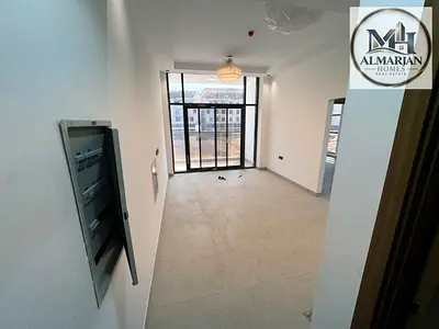 Brand-new 1BR in Al Alia, Ajman, spacious layout, panoramic windows, master bedroom, premium finishes, near Exit 311