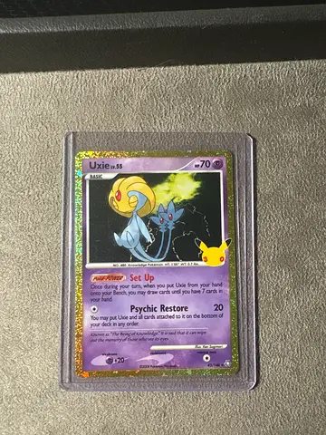 Rare Holo Psychic Pokémon Card (Uxie) - Graded Sleeve