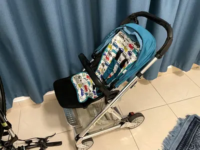 Mamas and Papas stroller with colorful padded seat - good condition