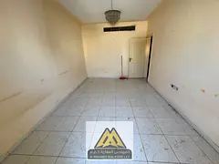 1BR in Liwara 2, balcony & central AC, near bus station and all services. AED 28K/year, 4 payments.