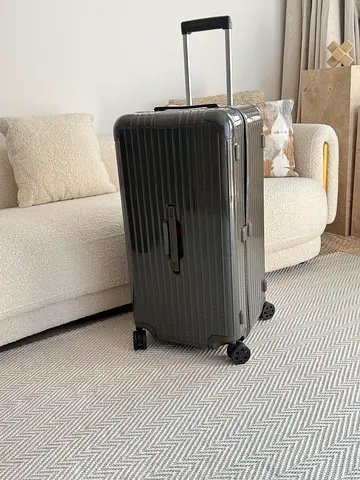 RIMOWA TRUNK PLUS SUITCASE