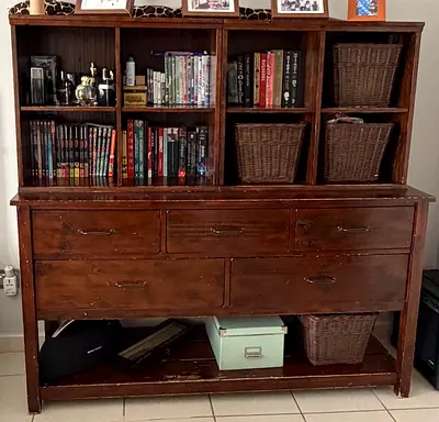 Wooden shelving unit with drawers and matching storage chest/TV stand. Used, with visible wear and s