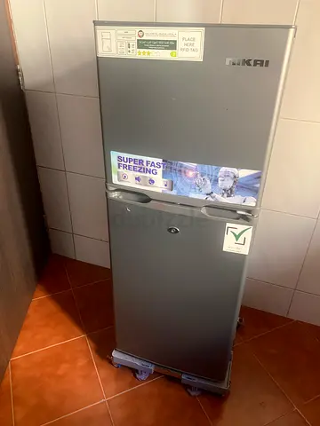 Used double-door refrigerator/freezer - compact top freezer unit