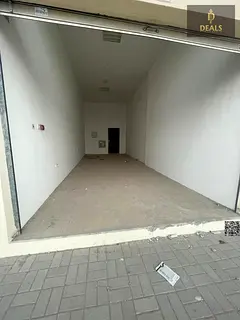 Prime Commercial Showroom for Rent in Al Jurf Industrial Area | 800 Sq. Ft. | Includes Office Space