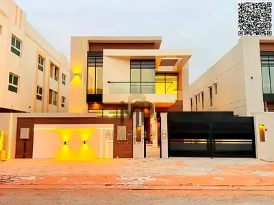 Luxury villa for sale in Al Muwaihat, spanning 5,000 square feet. Located in an exceptional area close to all amenities. Includes water, electricity,