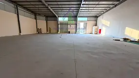 Spacious First-Use Warehouse in Al Sajaa | 6,260 Sq Ft | Prime Main Road Location | Two Gates | Comp