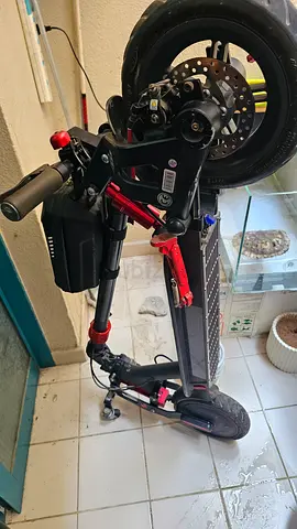 Used electric scooter with suspension and removable battery — good condition