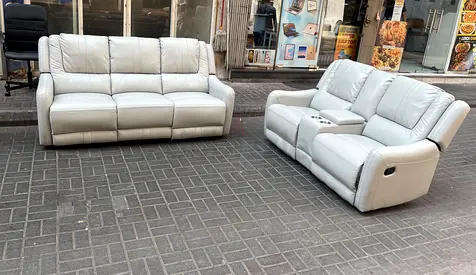 Light grey leather 3-seater sofa + 2-seater reclining loveseat with console