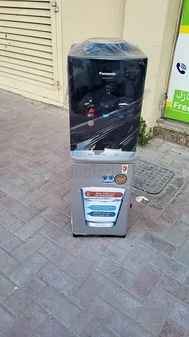 Top load water dispenser