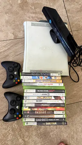 Xbox 360 with 14 games for sale