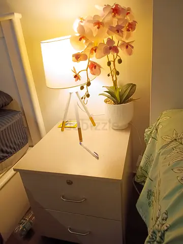 Bedside Table and Nightlamp with flower bouquet