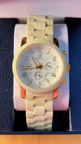 White ceramic-look men's wristwatch with gold accents