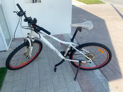 Used white mountain bike with front suspension - good for trails