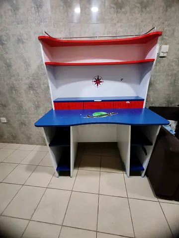 Kids study desk with shelves and storage - blue & red