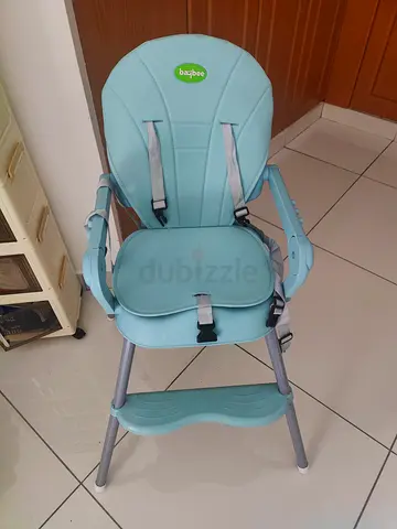 Light blue baby high chair with harness and footrest - Hardly used very very good condition