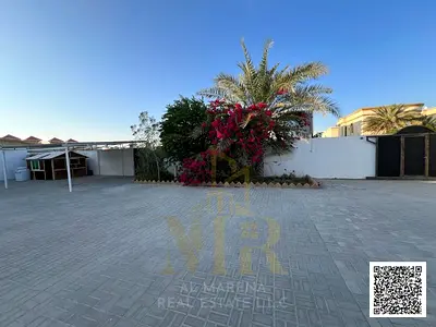 A prime opportunity in Al Rawda 2 – Ajman | 10,000 sq ft villa | Corner lot with 5 master bedrooms | Roof terrace | Electricity, water, and AC include