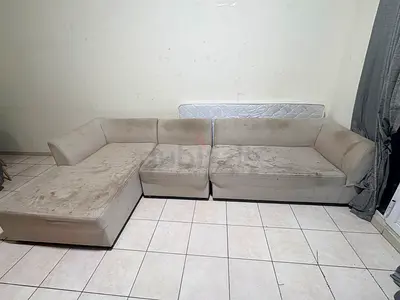 L-shaped beige fabric sectional sofa (used, needs cleaning)