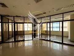 Office for rent in Al Majaz 1, Sharjah, featuring a sea view, spacious layout, free central air cond