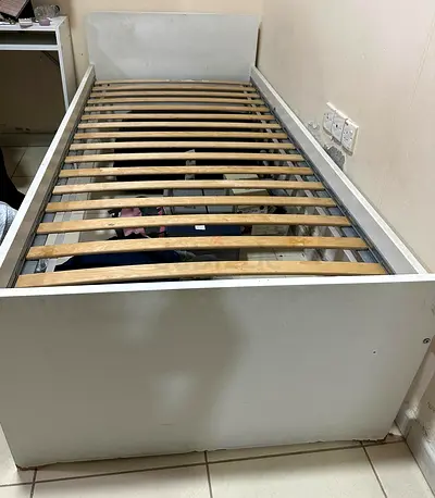single white bed frame with wooden slats — excellent condition high offer limited time