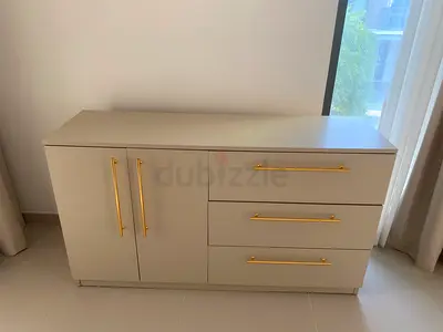 Minimalist beige sideboard with gold handles - good condition
