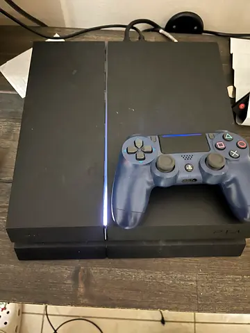 PlayStation 4 jailbroken with blu ray cd console with blue controller with charger, any game u want