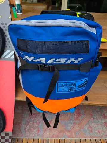 A high-performance freeride/freestyle 12-meter inflatable kite in the original blue and orange bag