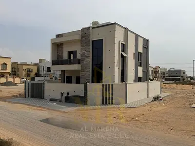 بالياسمين _عجمان _  فيلا زاويه علي شارعين | تشطيب راقي + 5 غرف ماستر  + طابقين وروف ~ سعر يشمل رسوم المكيفات