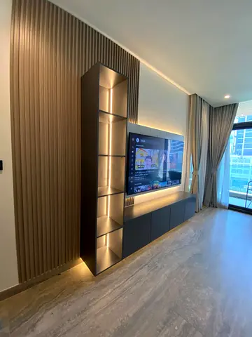 Custom made Modern built-in entertainment unit with LED shelving
