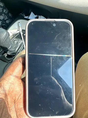 iPhone with case and charger cable - for parts or repair