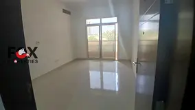 Two master bedrooms and a living room in a new building, featuring modern finishes, a comfortable de
