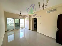 1-bedroom apartment in Al Taawun, Sharjah, featuring an open-view balcony and a parking space.