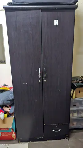 Dark brown two-door wardrobe / armoire in good used condition