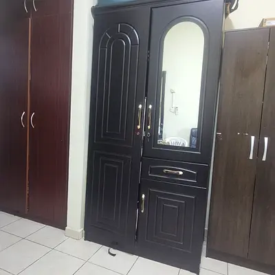Dark wood wardrobe with mirror and drawer - good condition