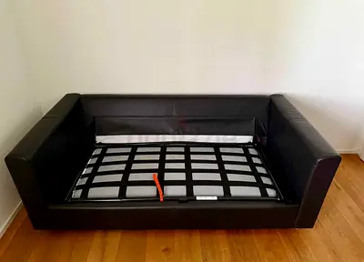 Black leather sofa bed frame  sturdy, good condition vimle