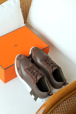 Brown designer casual sneakers with chunky white sole - preowned