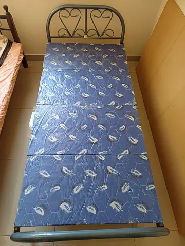 Used metal-legged foldable bed (scrap needs touch-up and repair)