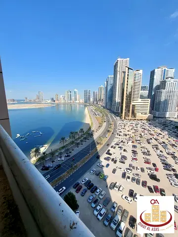 For rent: One-bedroom apartment with a living room in the Al Mamzar area, overlooking Mamzar Lake, with a parking space.