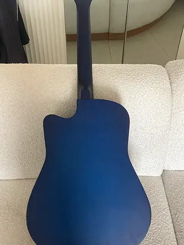 Blue cutaway acoustic-electric guitar in good condition