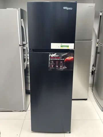 Used double-door refrigerator with top freezer - good condition