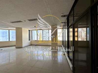 Office for rent in Al Majaz 1, Sharjah—suitable for business and professional activities. Includes free air conditioning and one month rent-free. An e