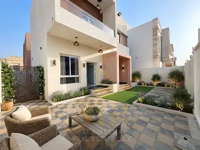 For sale in Al Yasmin area | Modern 3-bedroom villa, price includes electricity, water, and air conditioning. Freehold ownership.
