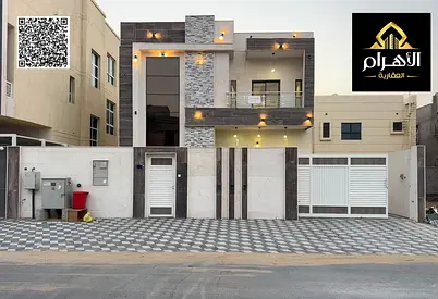 Modern villa (includes water, electricity, air conditioning, and furniture) – features a majlis, 2 living areas, and a spacious courtyard – freehold o