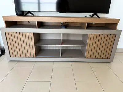 Modern TV Entertainment Unit with Sliding Slatted Doors