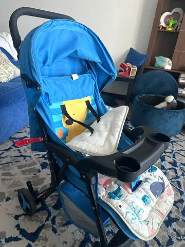 Lightweight blue baby stroller/pram in good used condition