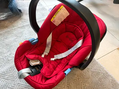 Used red infant car seat / baby carrier (rear-facing) - good condition. Cybex Aton Infant Car Seat