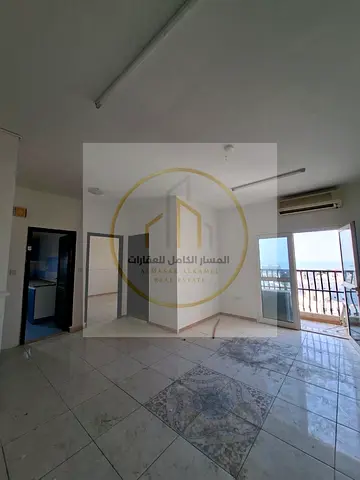 1-Bedroom Apartment for Annual Rent in Al Qulayaah, Sharjah, in a prime location close to all services and amenities, for AED 25,000 per year, ideal f