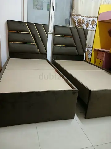 Brand new single bed frame with padded headboards - good condition