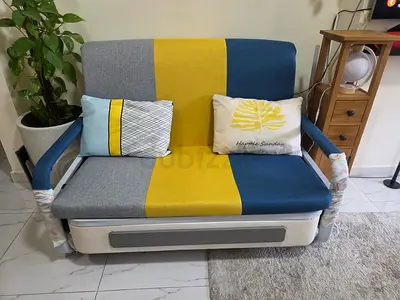 Compact 2-seater Sofa Bed in Blue/Yellow/Grey - Good Condition